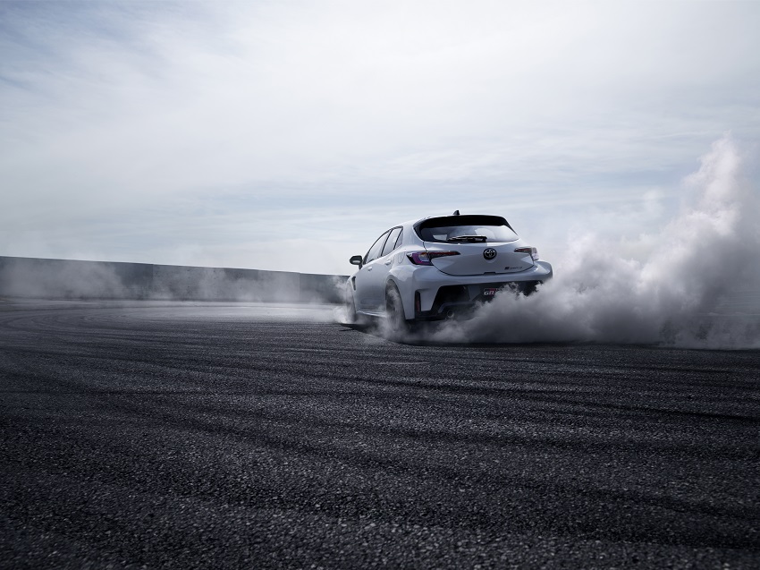 The GR Corolla shredding its tyres on a circuit.