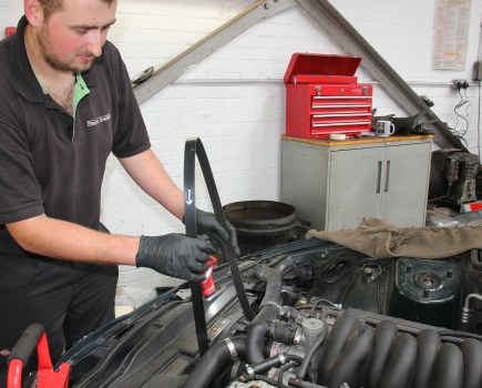 changing an auxiliary drivebelt