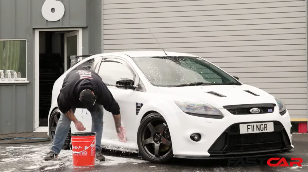 Man washing a car